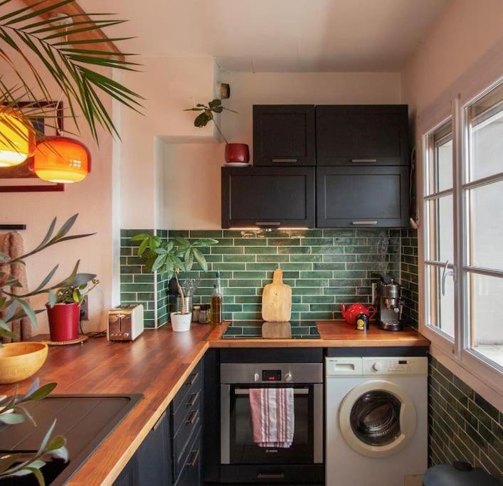 Kuchyňa alebo kuchynka v ubytovaní Appartement T3 70m2 lumineux proche de la gare