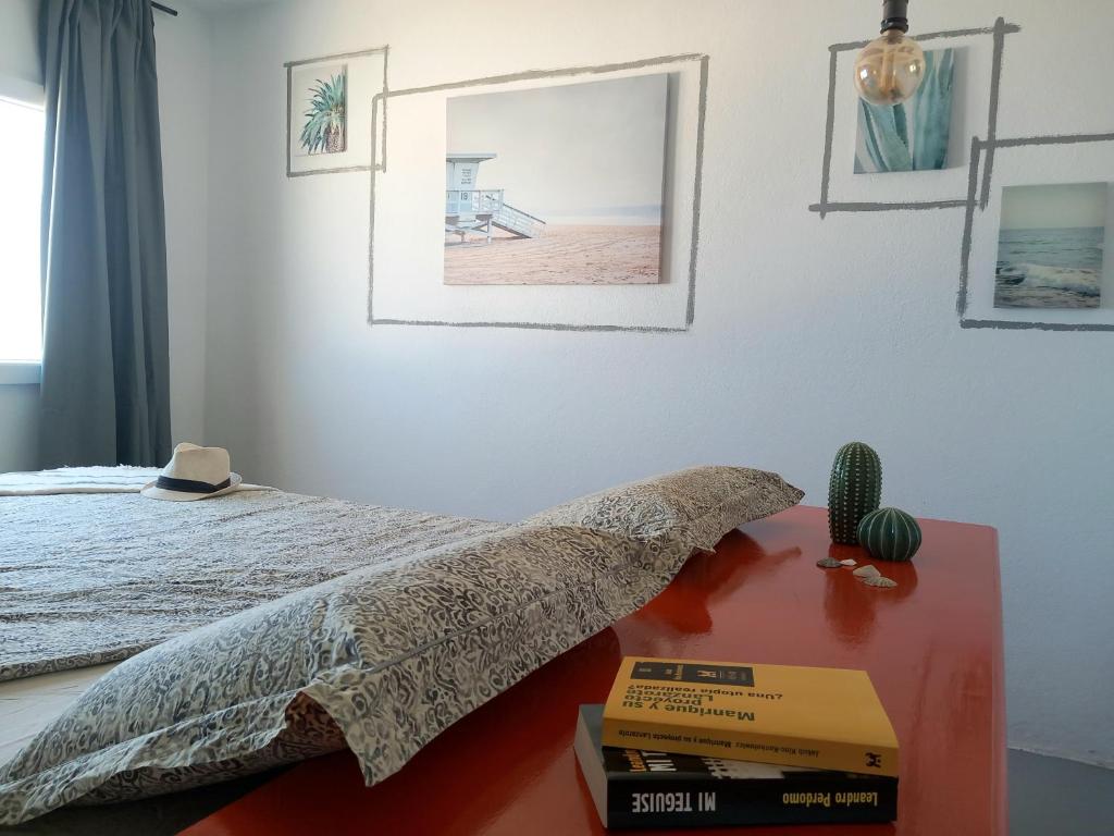 A bed or beds in a room at Loft con vista mare