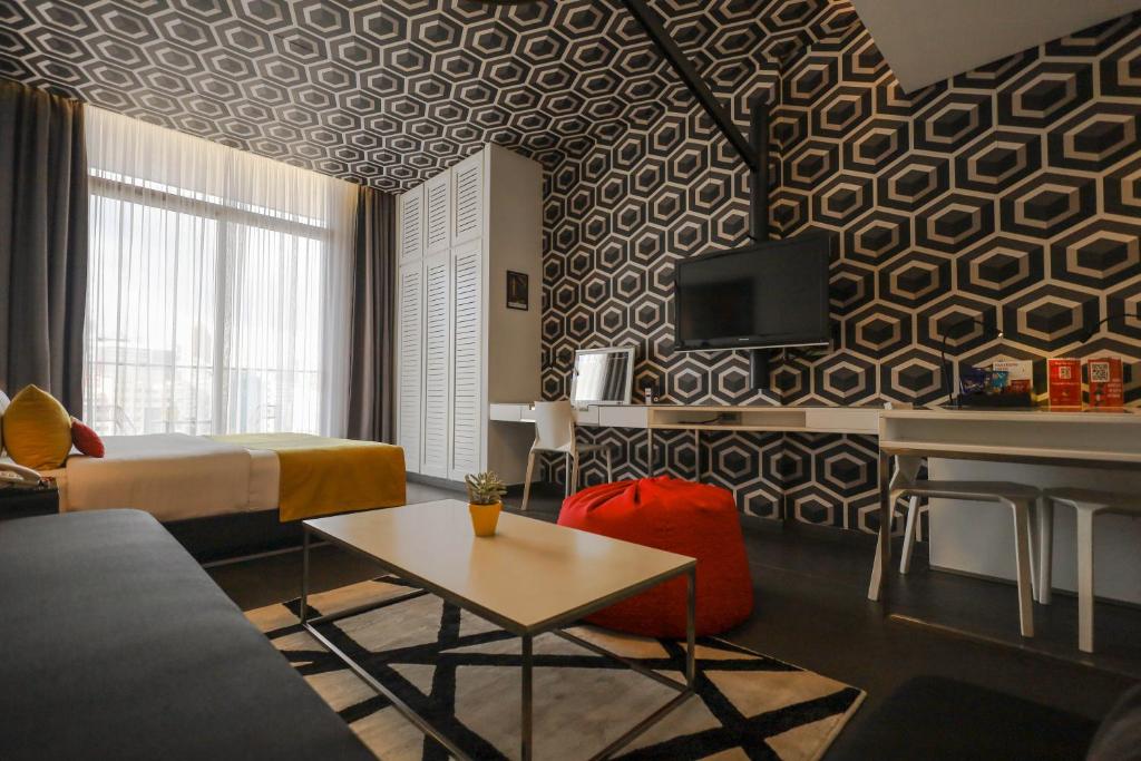 TV a/nebo společenská místnost v ubytování The Smallville Hotel