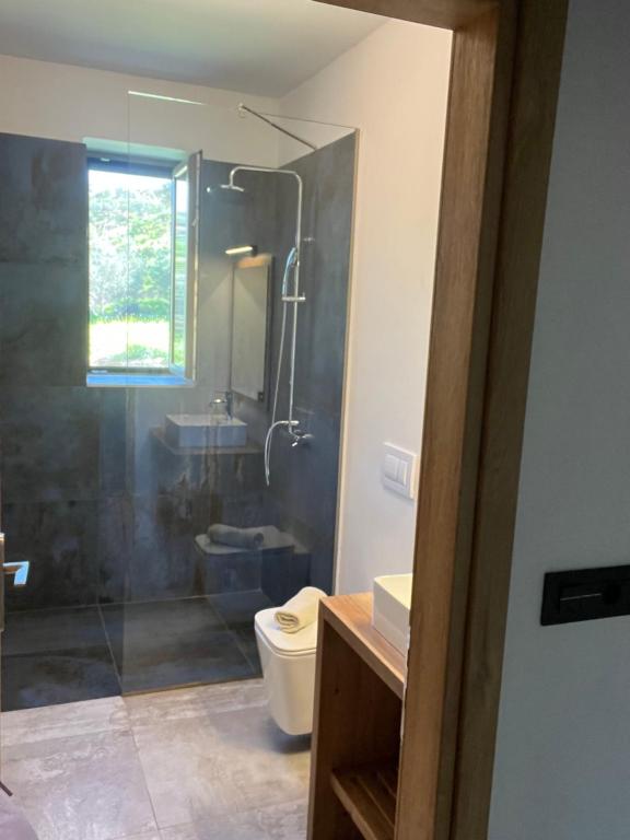 A bathroom at Villas Kozilis - Kozilis Estate