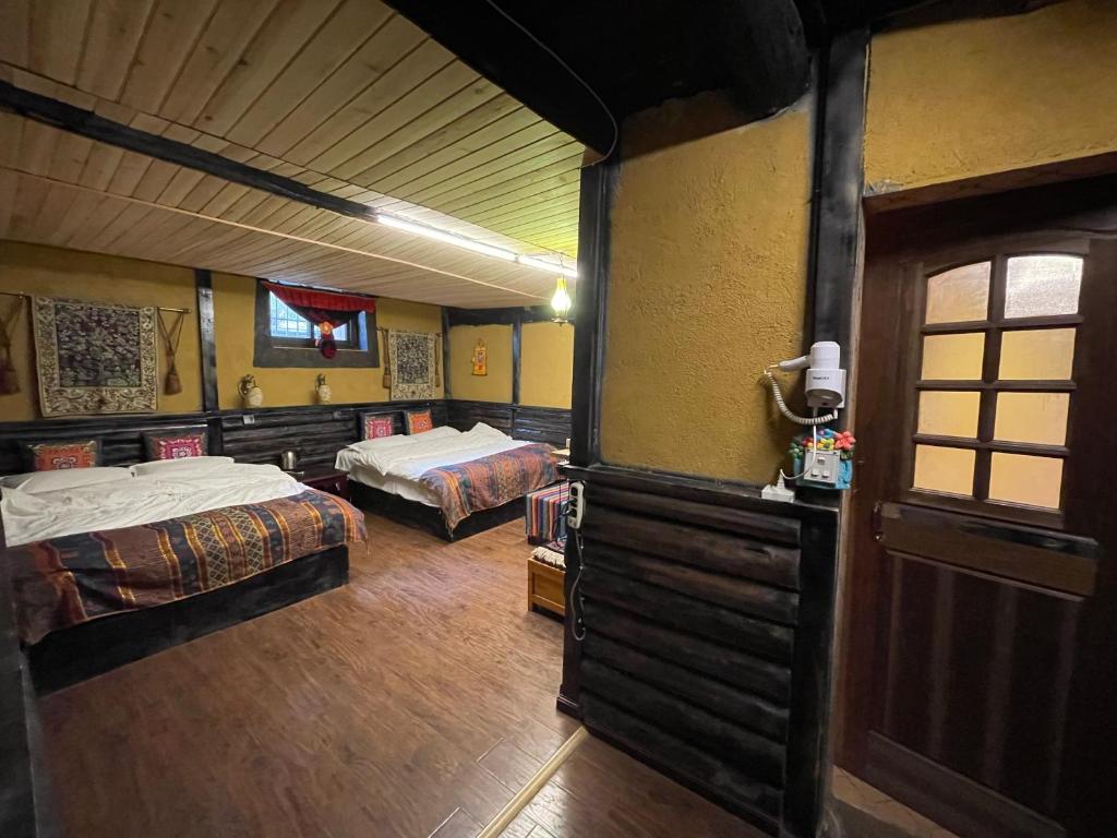 Postel nebo postele na pokoji v ubytování Timeless Inn