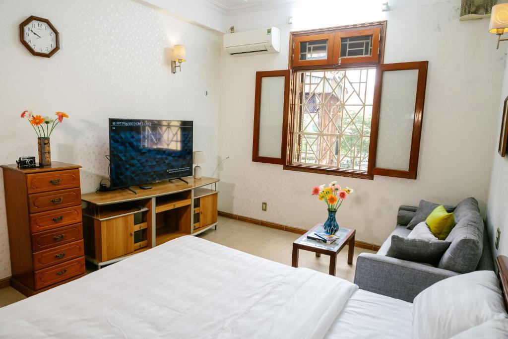 TV a/nebo společenská místnost v ubytování Hola House Hanoi