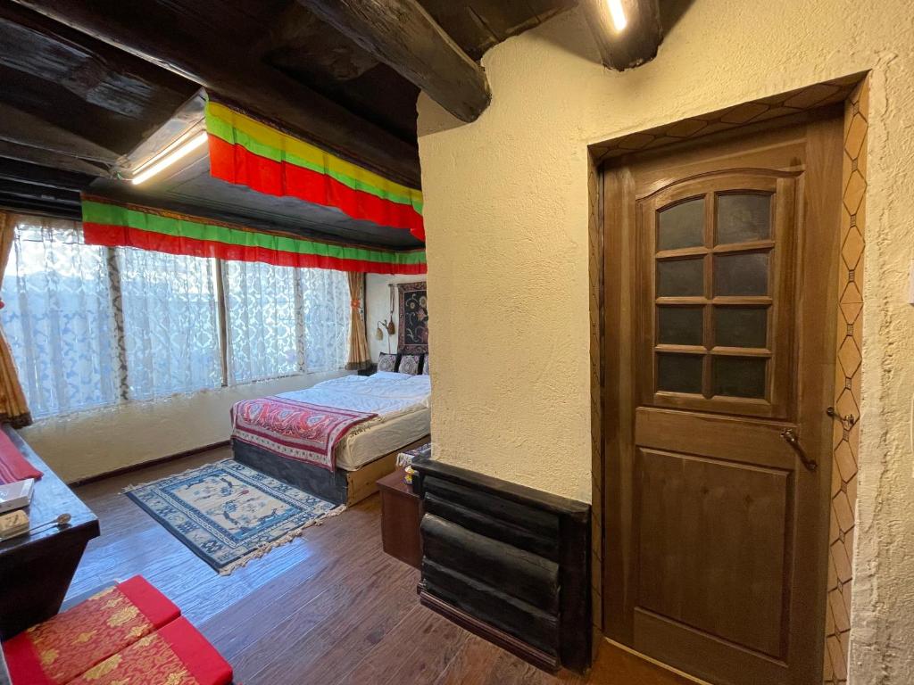 Postel nebo postele na pokoji v ubytování Timeless Inn