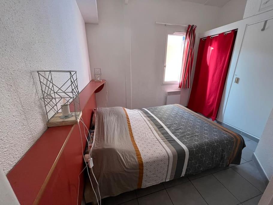 Posteľ alebo postele v izbe v ubytovaní Charmant appartement en Village Club avec piscine
