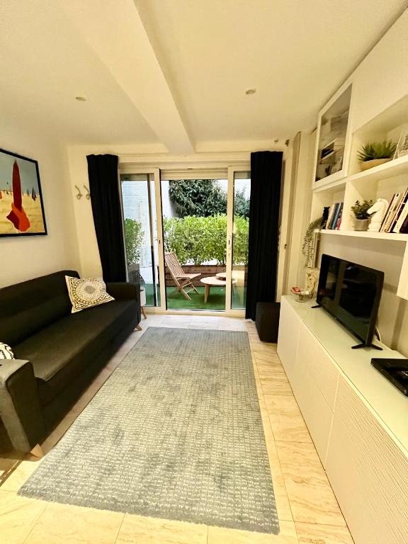 Posedenie v ubytovaní Deauville, maison au coeur de la ville