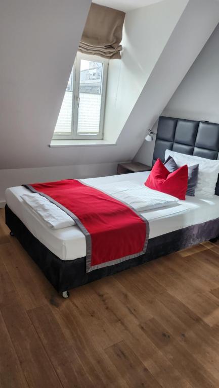 Postel nebo postele na pokoji v ubytování Gideon Hotel