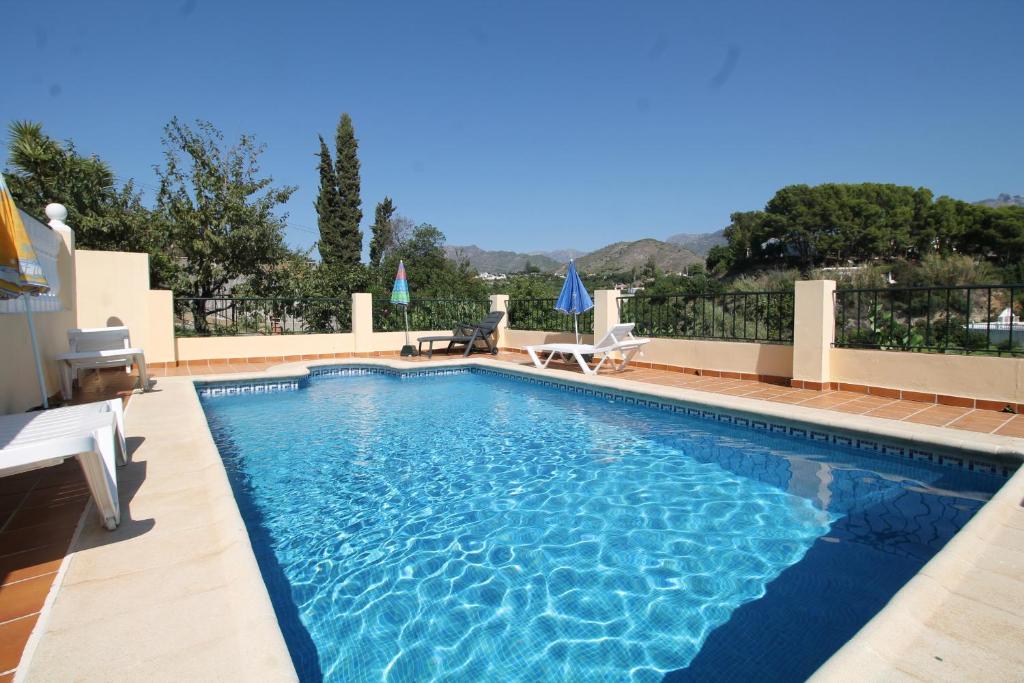 Bazén v ubytovaní Villa Conchi by Spainsunrentals 1091 alebo v jeho blízkosti