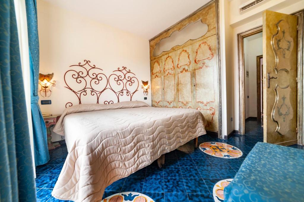 Postel nebo postele na pokoji v ubytování Hotel Terme Don Pepe