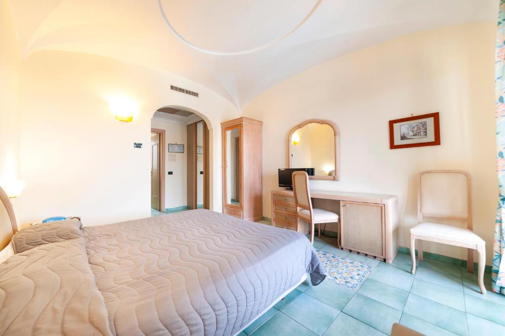 Postel nebo postele na pokoji v ubytování Hotel Terme Don Pepe