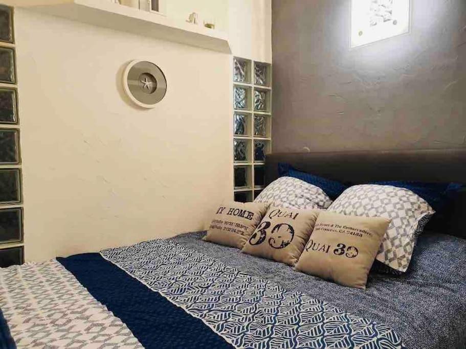 Posteľ alebo postele v izbe v ubytovaní Appartement Vue Mer - RDC - Parking Privé - Meublé Tourisme 4 étoiles
