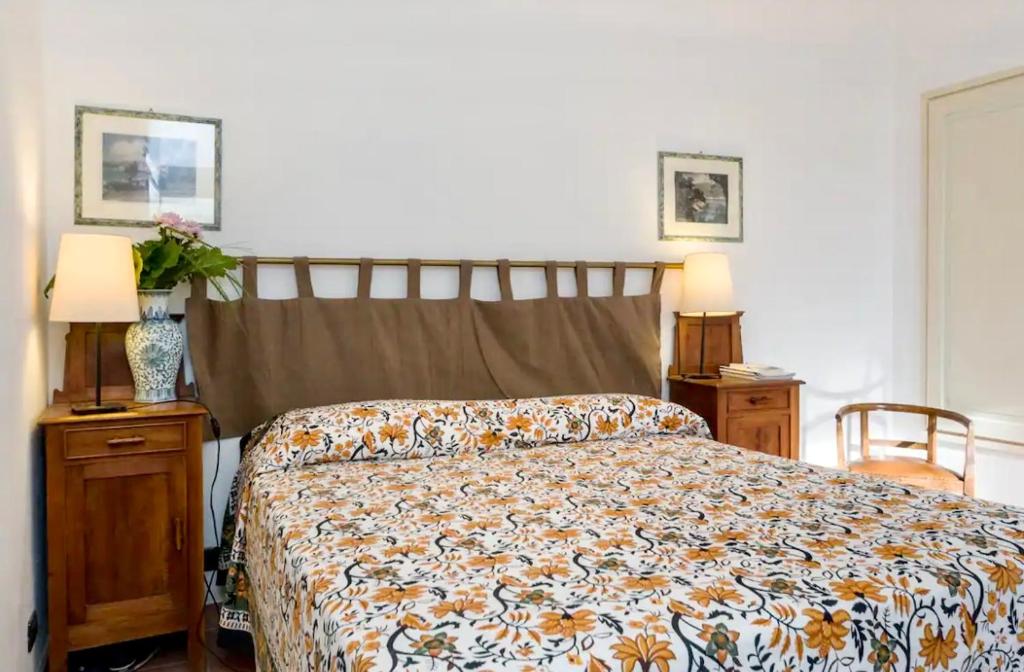 Postel nebo postele na pokoji v ubytování Giardino in villa Margherita