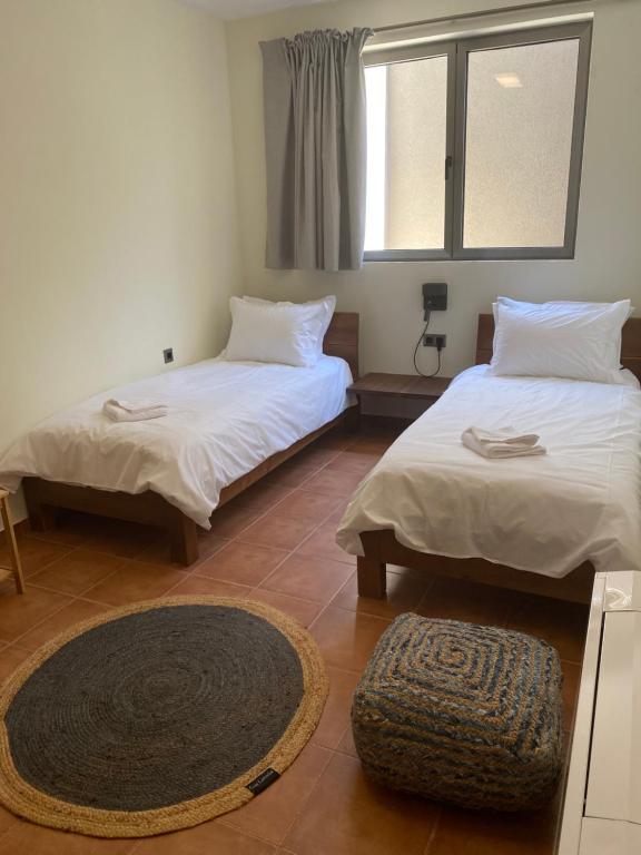 Postel nebo postele na pokoji v ubytování Real Life Homes luxurious seafront villas each with their own private pools