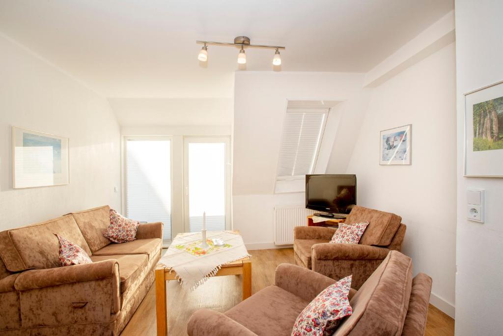 Posezení v ubytování Uhlenkamp Appartement -8- im UHLENKAMP