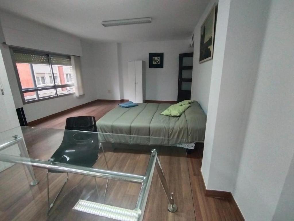 Postel nebo postele na pokoji v ubytování Apartamento Puerta Nueva (Universidad la Merced)