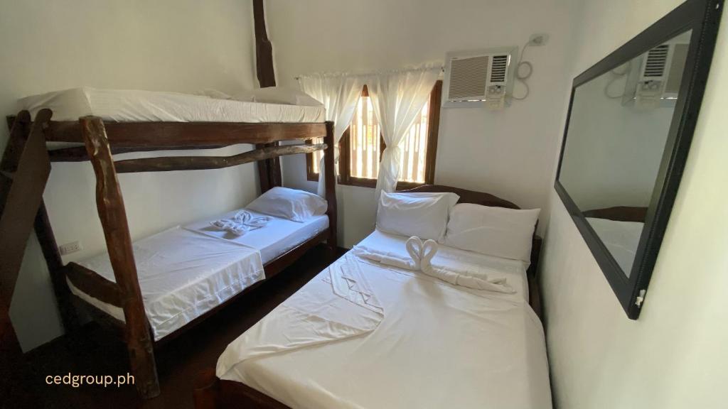 Postel nebo postele na pokoji v ubytování CED Villas