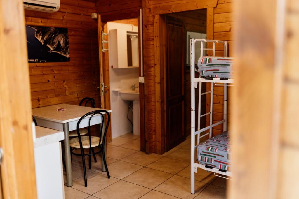 Kuchyň nebo kuchyňský kout v ubytování Camping La Pineta