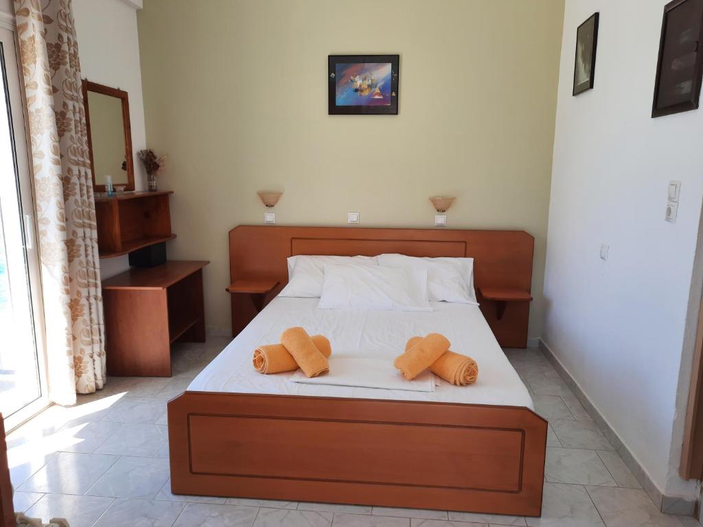 Postel nebo postele na pokoji v ubytování Voula Beach