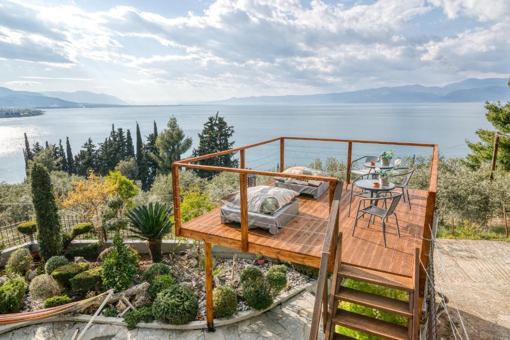 a house with a view of the water at Magical view studios Asproneri, Kamena Vourla in Kamena Vourla
