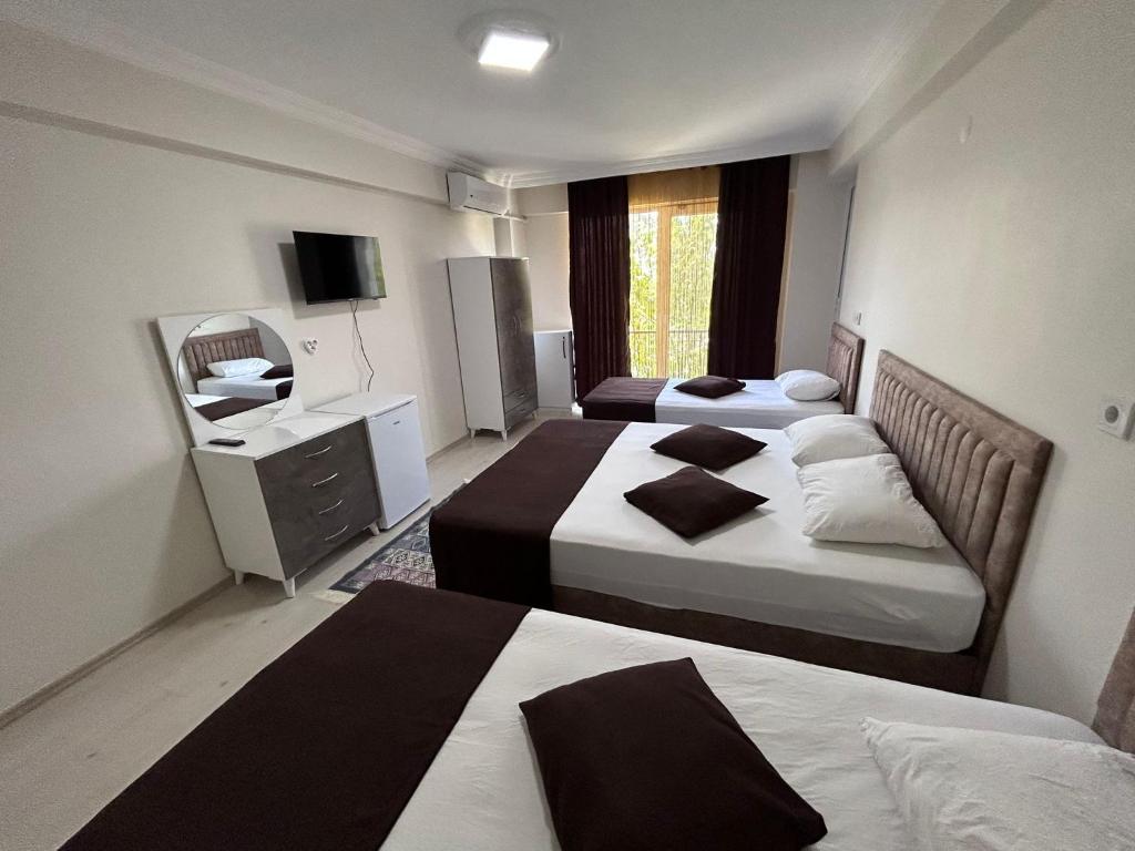 Postel nebo postele na pokoji v ubytování Paradise House