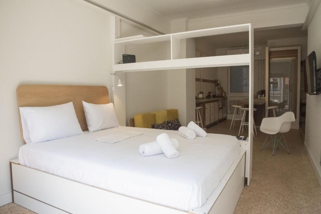 Postel nebo postele na pokoji v ubytování Syntagma View Apartment