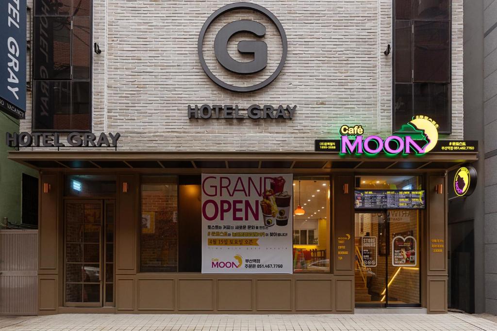 a store front with a sign in front of it at Hotel Gray in Busan