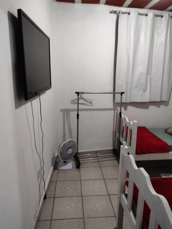 TV a/nebo společenská místnost v ubytování Hospedagem Progresso