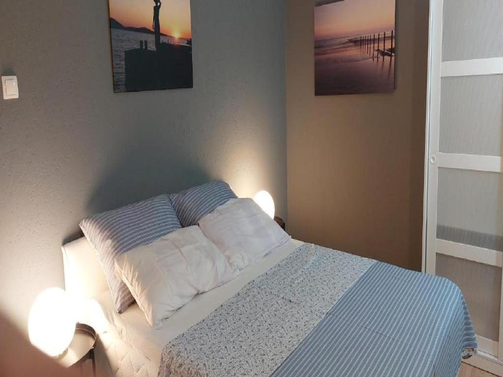 Postel nebo postele na pokoji v ubytování Villa Mery