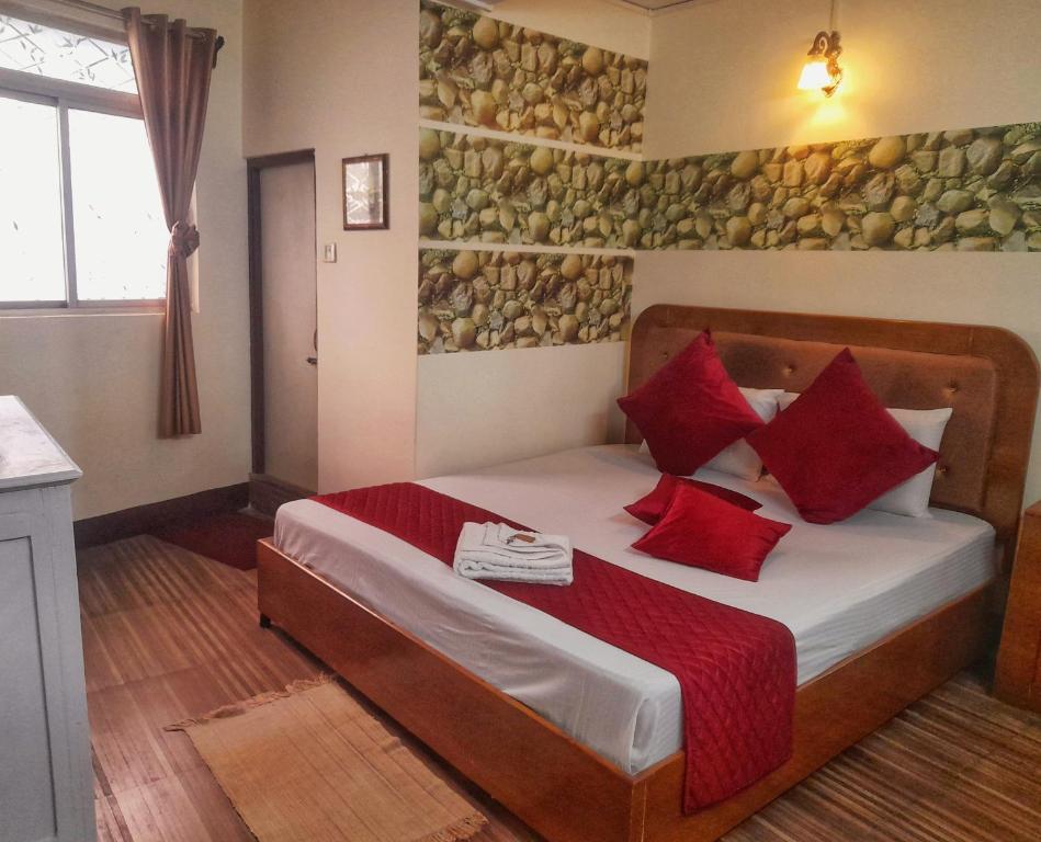 Postel nebo postele na pokoji v ubytování Mysa Homestays