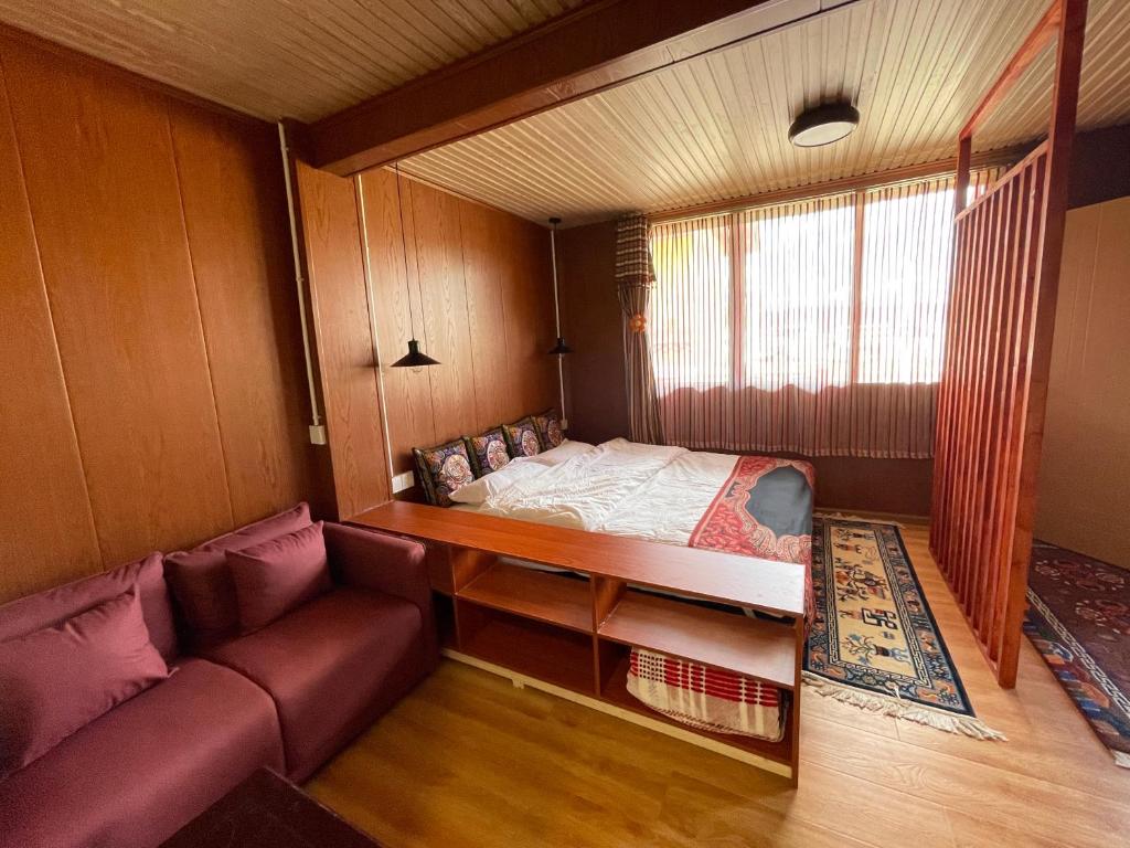 Postel nebo postele na pokoji v ubytování Timeless Inn