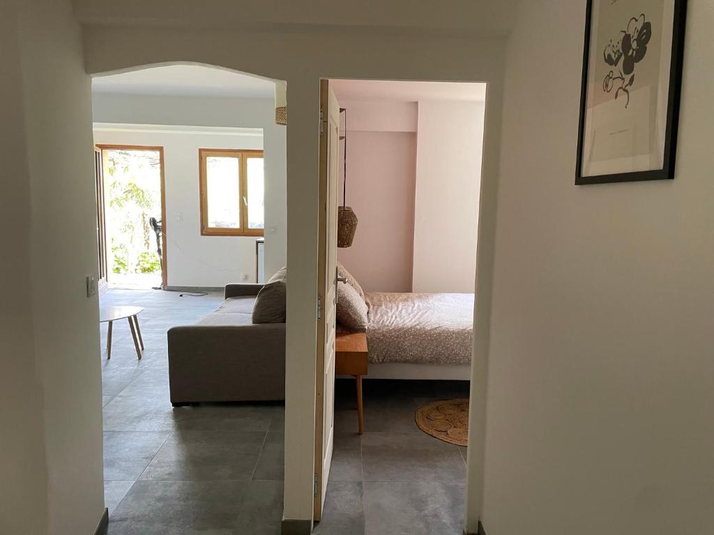 Posteľ alebo postele v izbe v ubytovaní Appartement avec jardin privatif