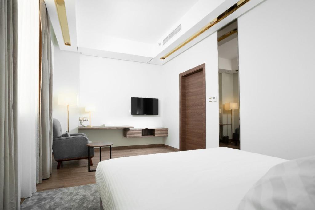 TV a/nebo společenská místnost v ubytování AKASIYA HOTEL