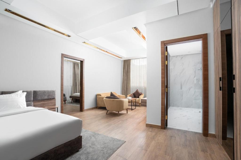 Postel nebo postele na pokoji v ubytování AKASIYA HOTEL