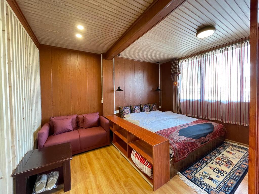 Postel nebo postele na pokoji v ubytování Timeless Inn