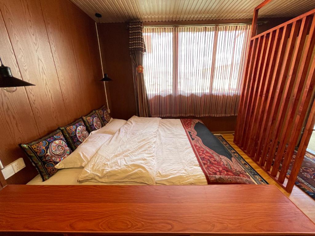 Postel nebo postele na pokoji v ubytování Timeless Inn