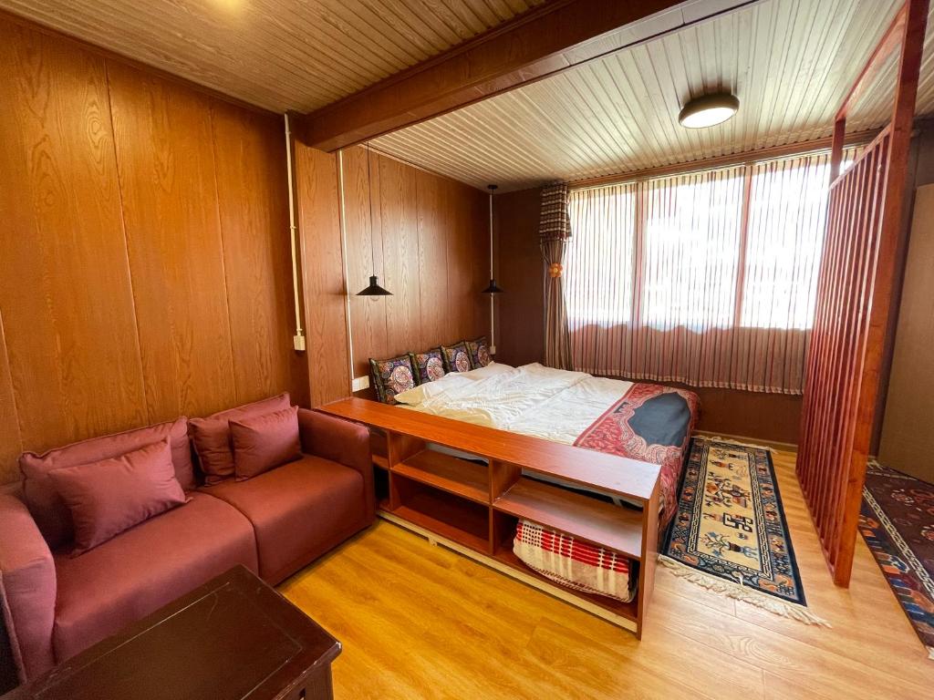 Postel nebo postele na pokoji v ubytování Timeless Inn