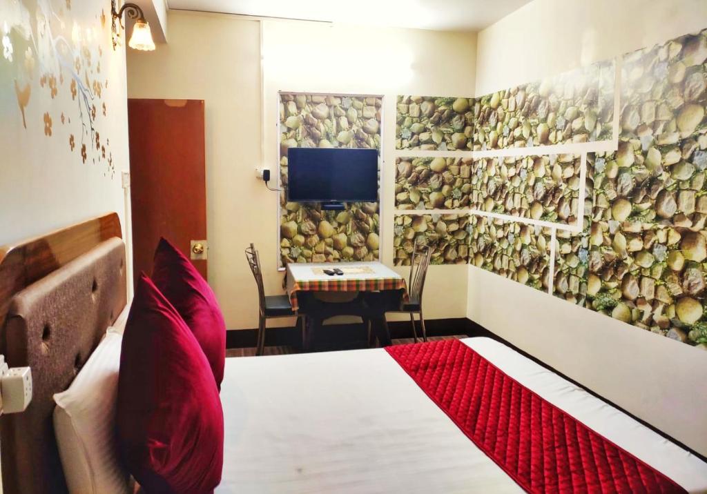 Postel nebo postele na pokoji v ubytování Mysa Maya Homestay