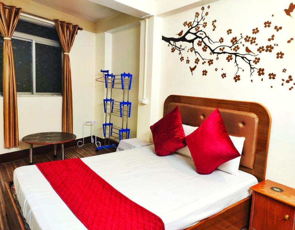 Postel nebo postele na pokoji v ubytování Mysa Maya Homestay