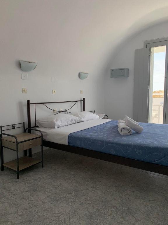 Postel nebo postele na pokoji v ubytování M.G. Hotel Studio & Apts
