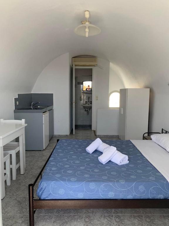 Postel nebo postele na pokoji v ubytování M.G. Hotel Studio & Apts