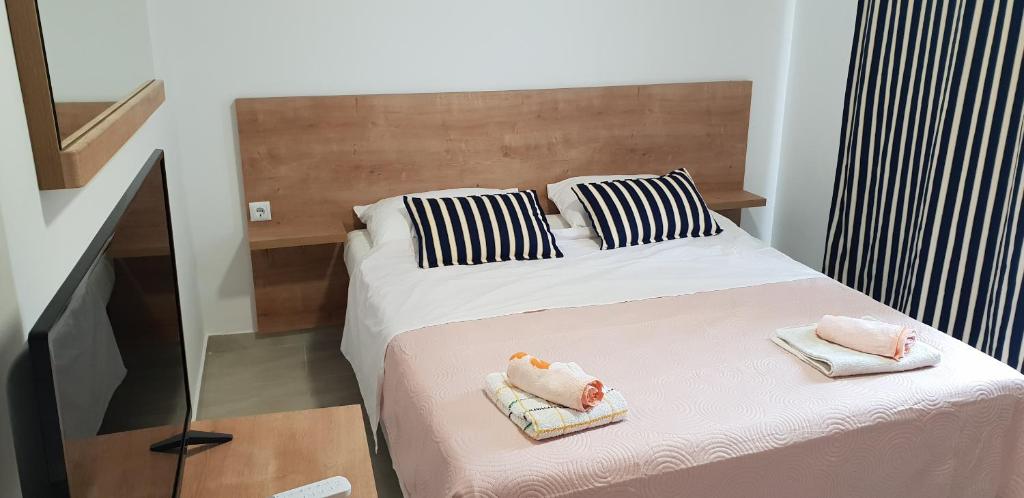 Postel nebo postele na pokoji v ubytování Kuća Pećine