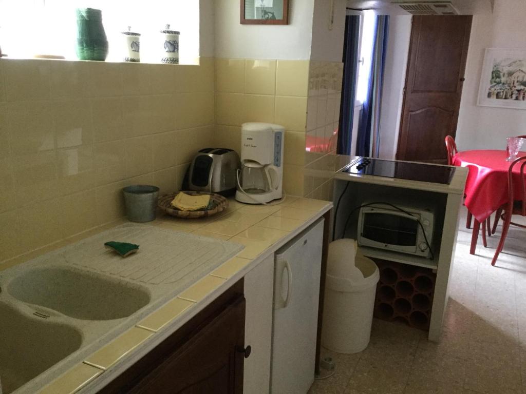 Kuchyň nebo kuchyňský kout v ubytování Villa Delphina