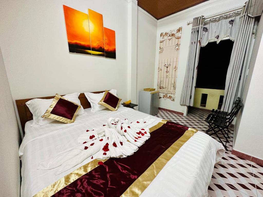 Postel nebo postele na pokoji v ubytování DK House Homestay