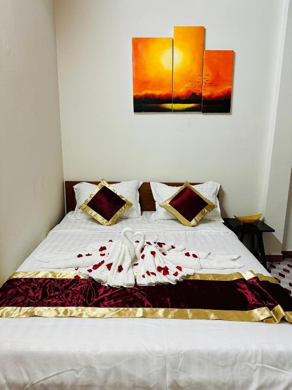 Postel nebo postele na pokoji v ubytování DK House Homestay