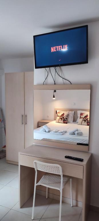 Postel nebo postele na pokoji v ubytování ILIDA apartments