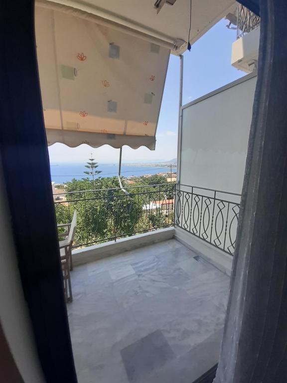 Balkón nebo terasa v ubytování KAMARI APARTMENTS