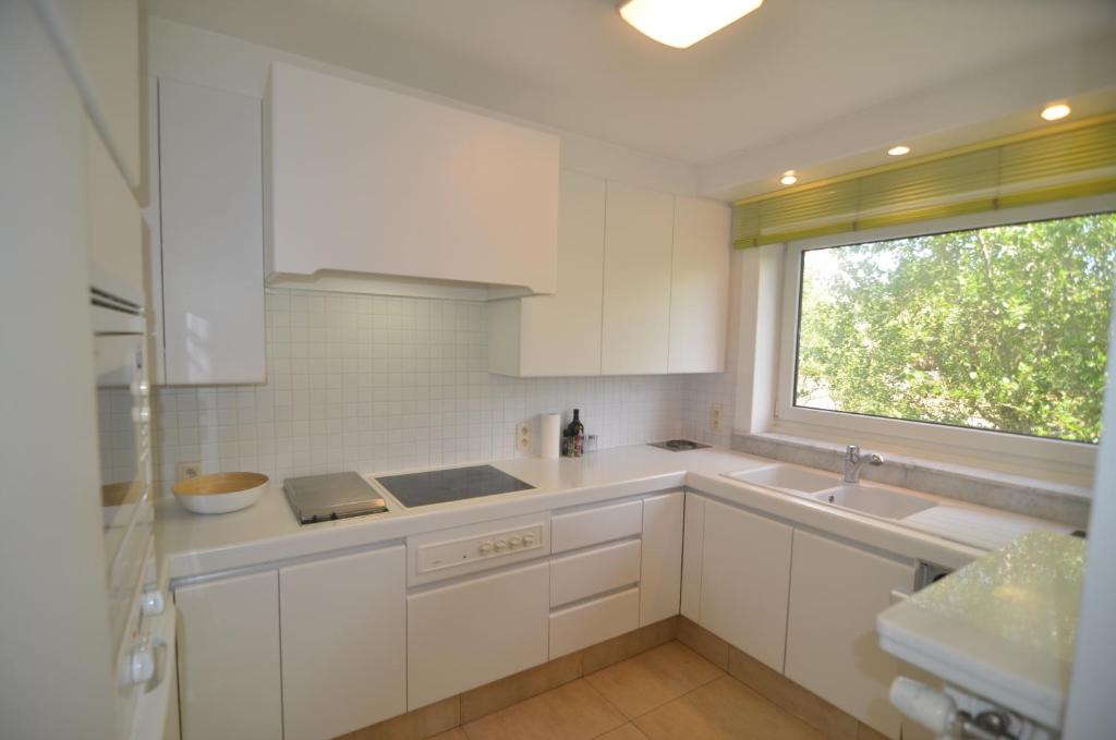 Kuchyň nebo kuchyňský kout v ubytování Oostduinkerke Apartments