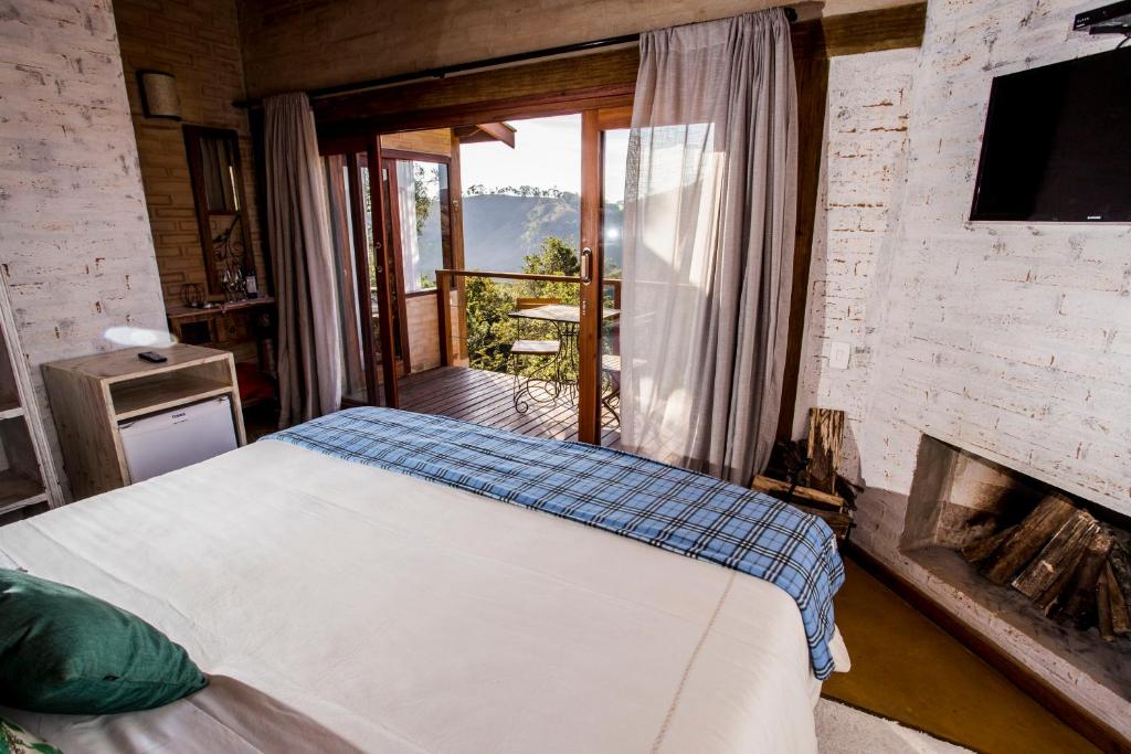 Postel nebo postele na pokoji v ubytování Pousada Villa Catarina