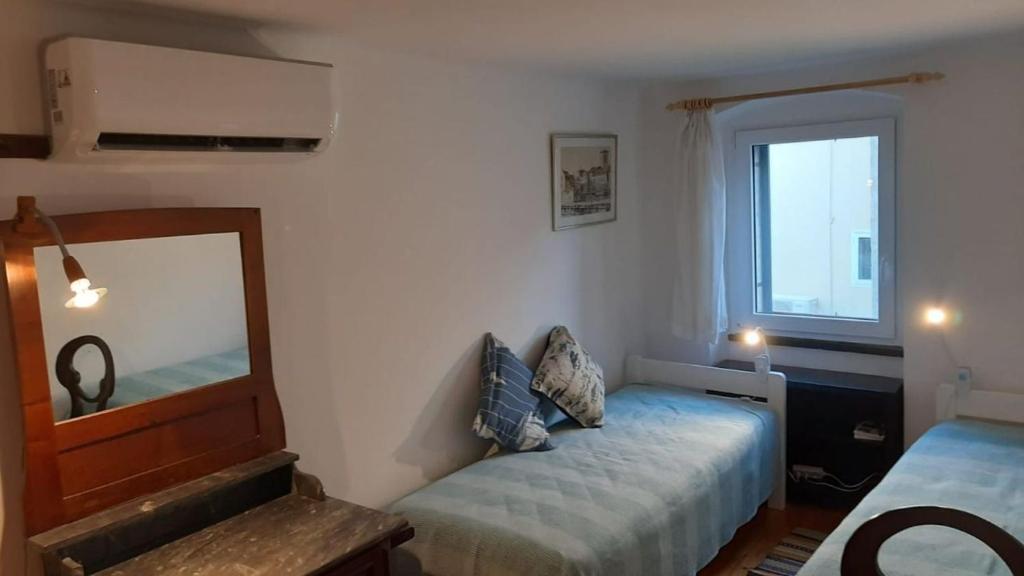 Voodi või voodid majutusasutuse House Markovina toas