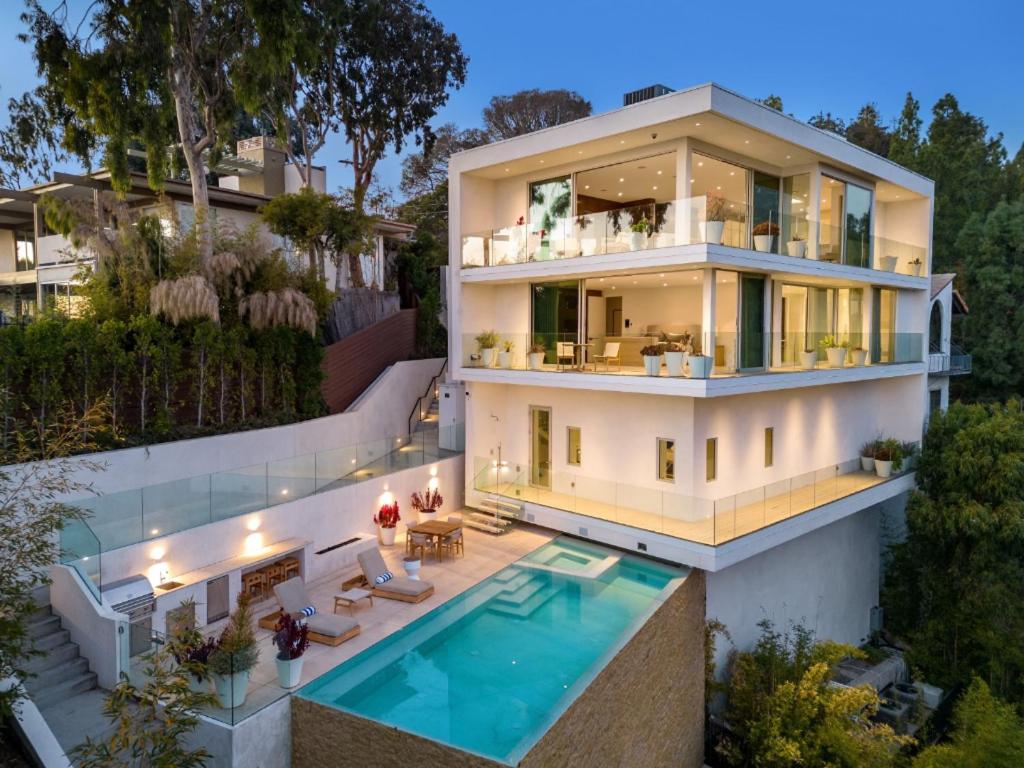 an aerial view of a house with a swimming pool at Beverly Grove in Los Angeles