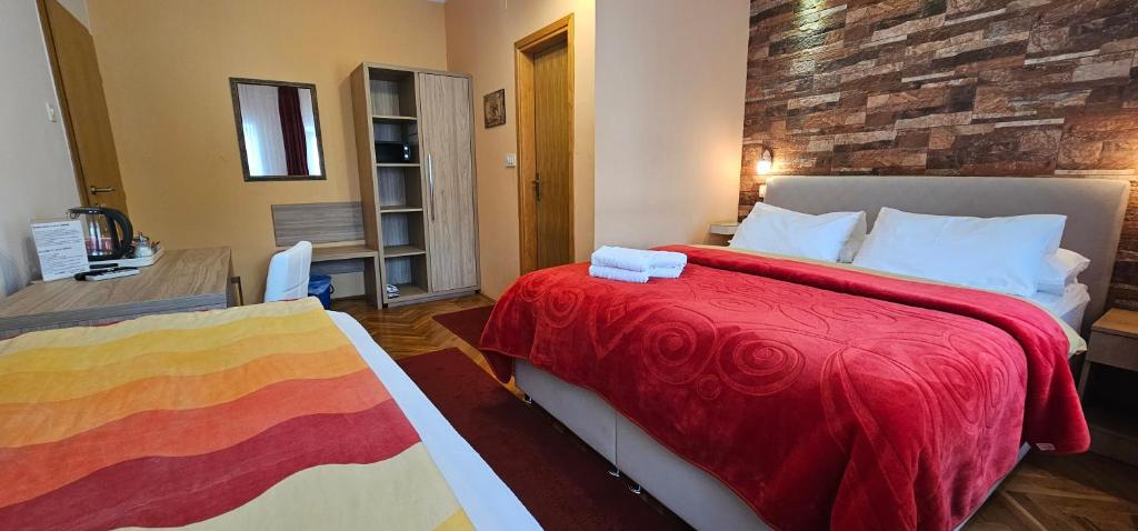 Postel nebo postele na pokoji v ubytování Villa Cardak
